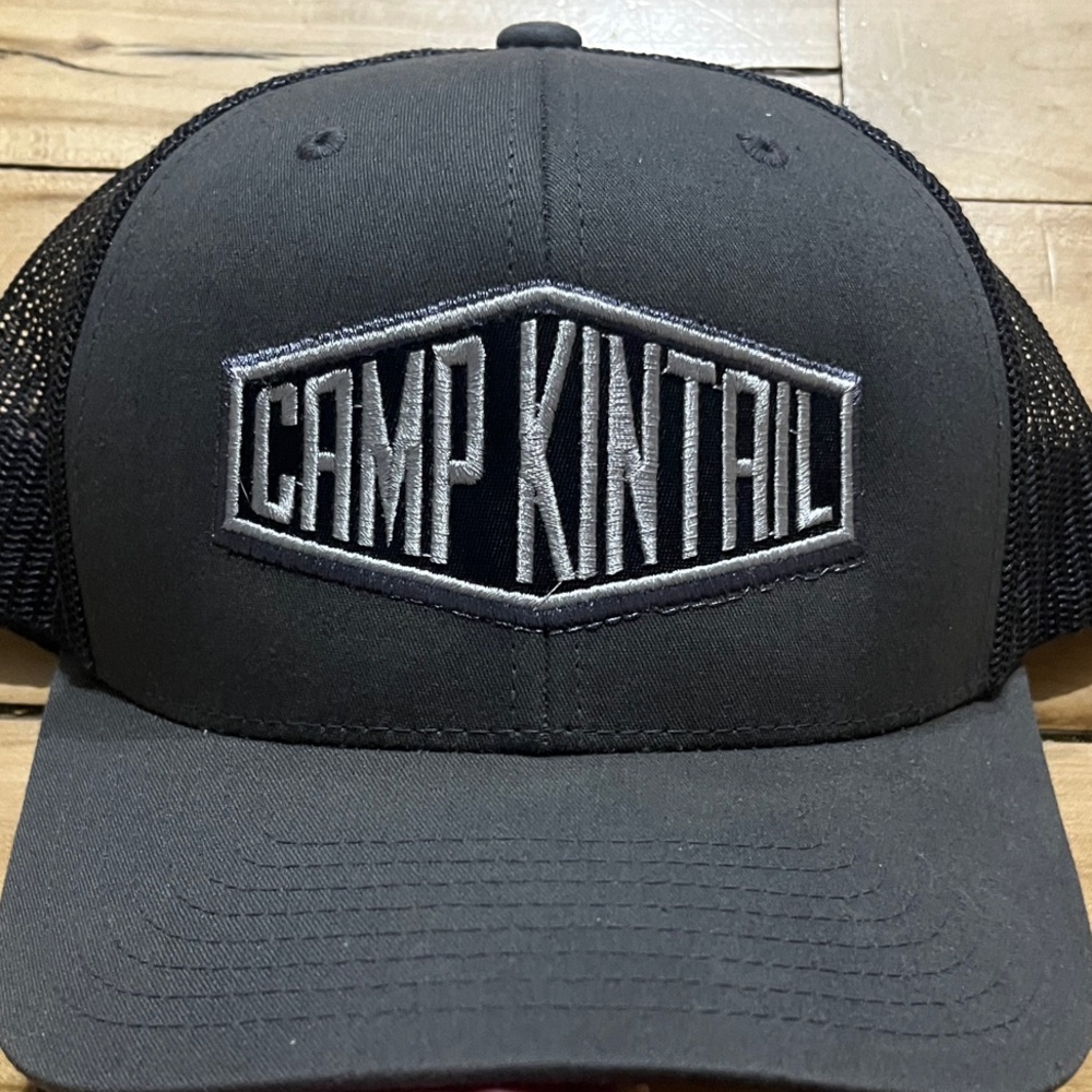Gray Trucker Hat with Camp Kintail logo embroidery